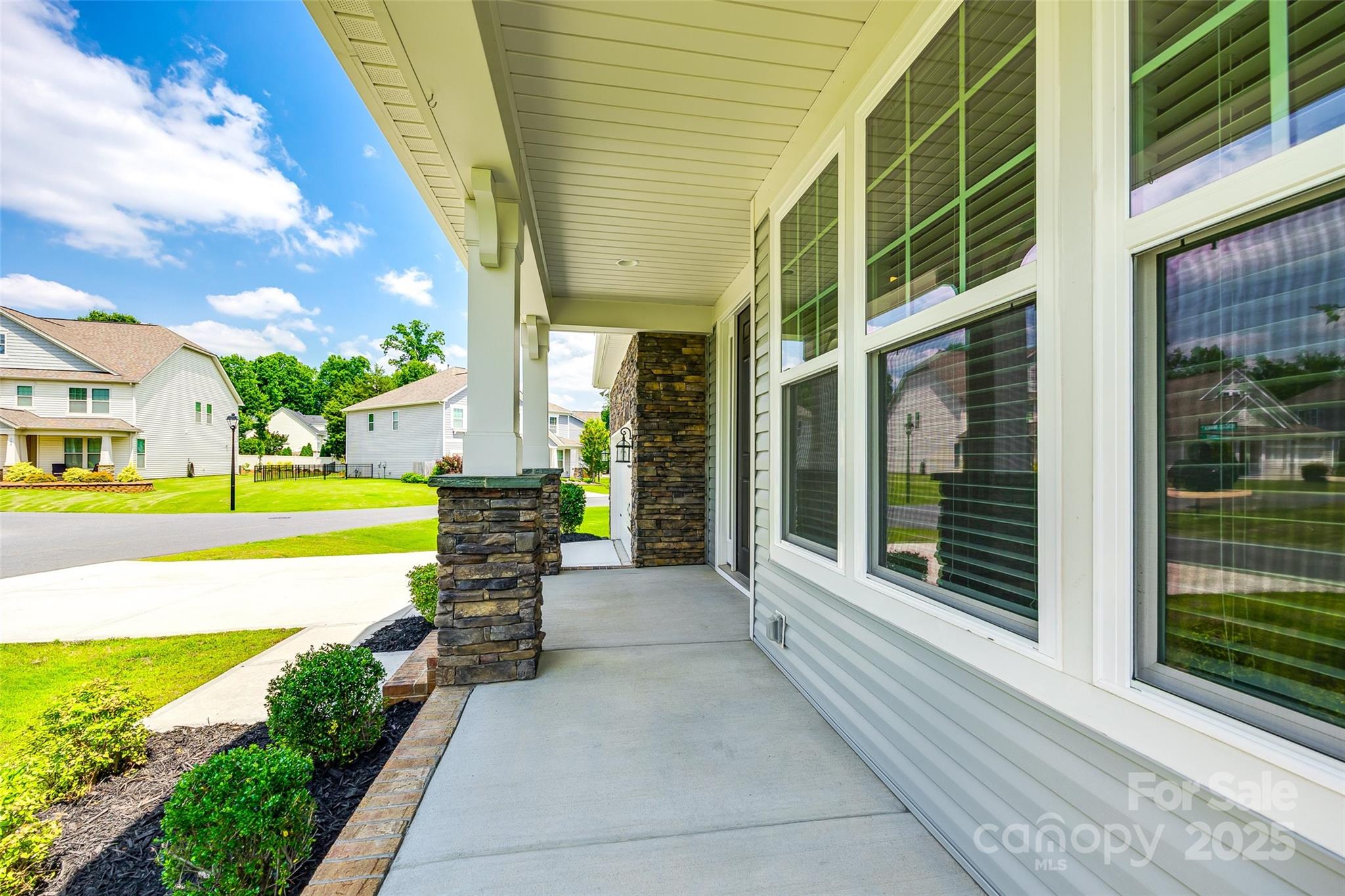 173 Morgan's Branch Road Belmont, NC 28012 - Photo 2 of 29 a house view with a garden space