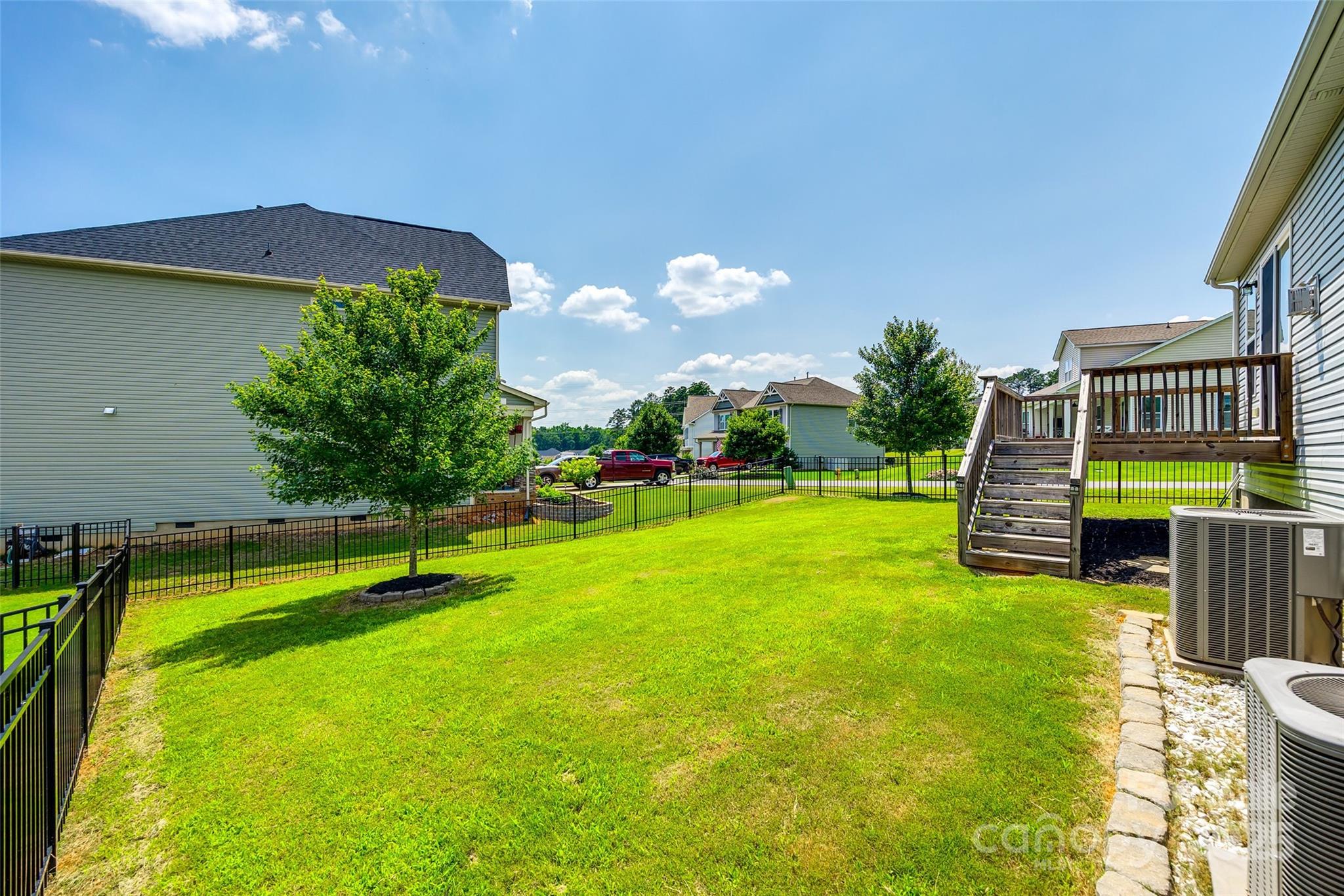 173 Morgan's Branch Road Belmont, NC 28012 - Photo 25 of 29 a view of a garden with lawn chairs