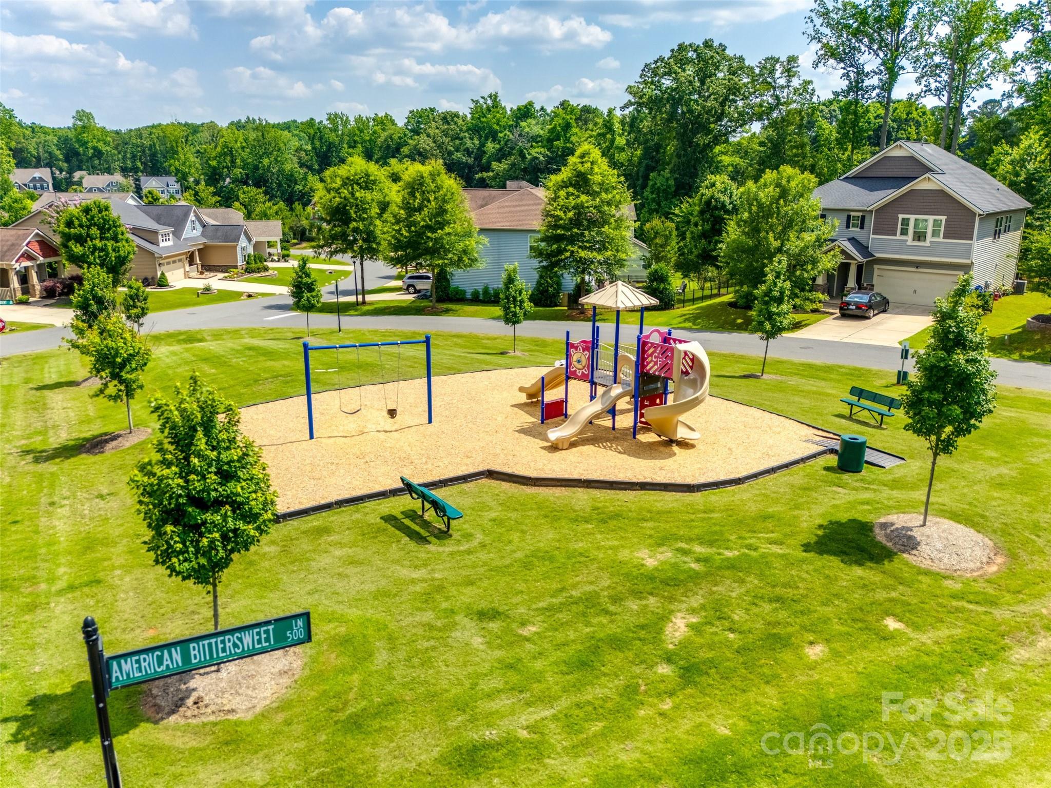 173 Morgan's Branch Road Belmont, NC 28012 - Photo 27 of 29 a view of swimming pool with a garden and trees