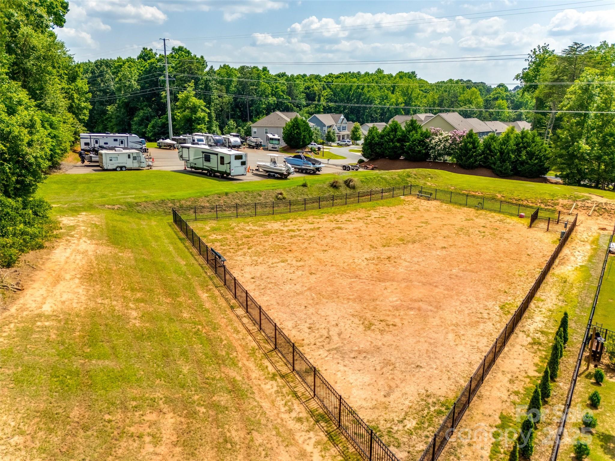 173 Morgan's Branch Road Belmont, NC 28012 - Photo 29 of 29 a view of swimming pool with seating area and trees in the background