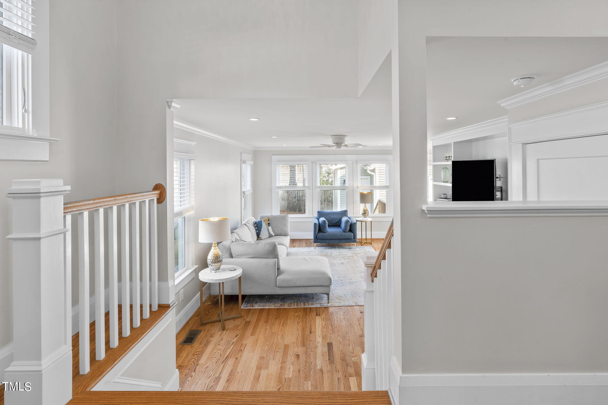 529 Euclid Street Raleigh, NC 27604 - Photo 13 of 37 a living room with furniture wooden floor and a flat screen tv