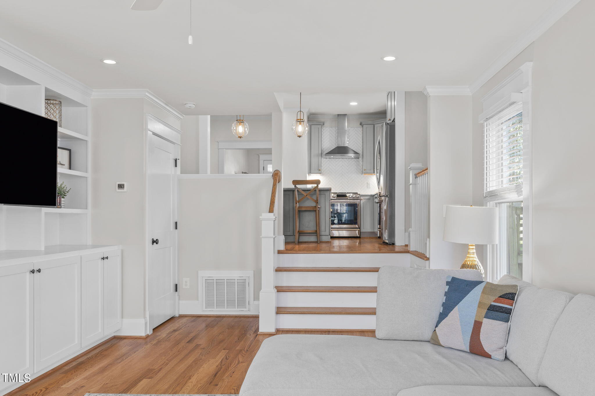 529 Euclid Street Raleigh, NC 27604 - Photo 16 of 37 a living room with furniture and a flat screen tv