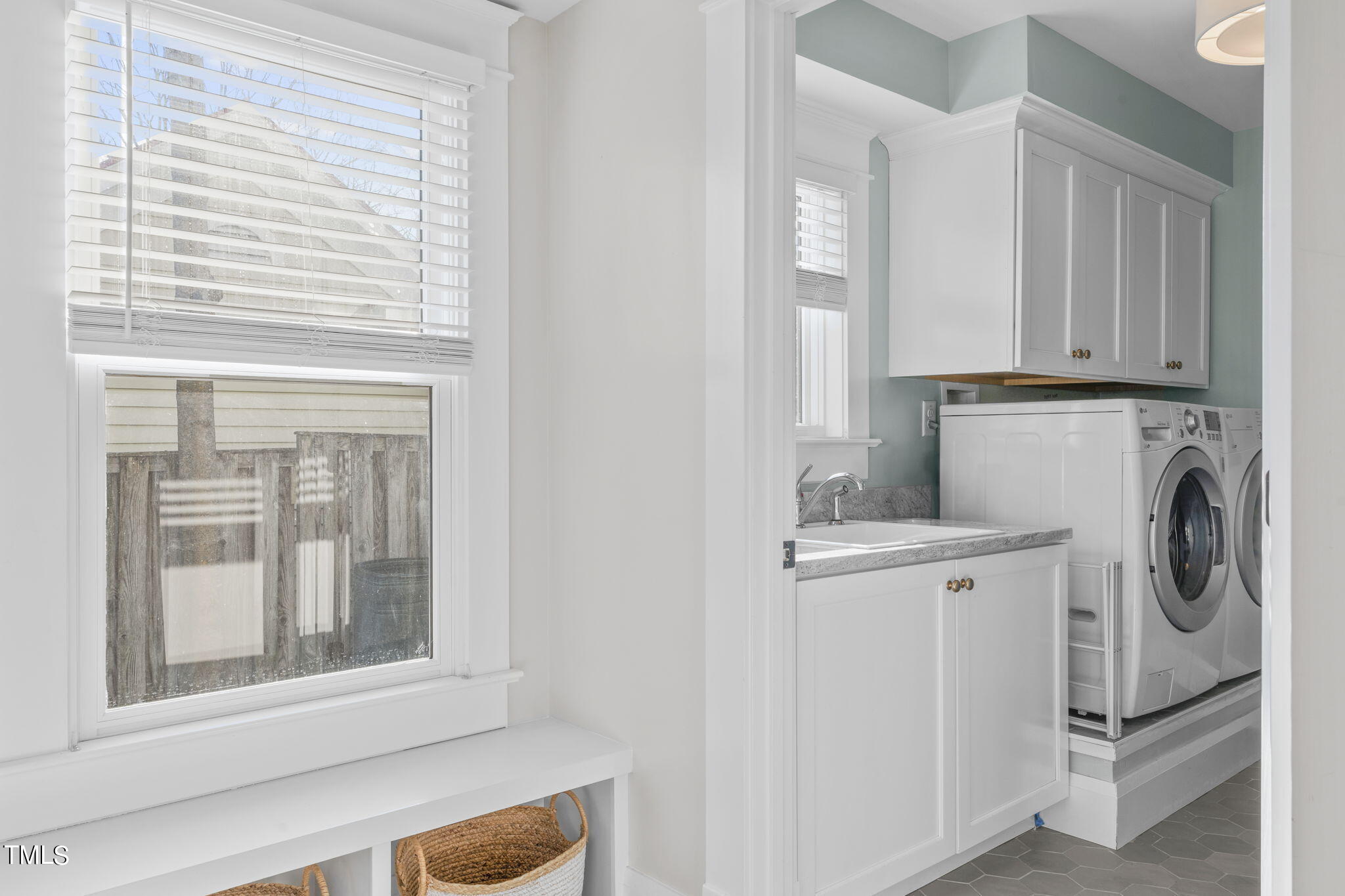 529 Euclid Street Raleigh, NC 27604 - Photo 19 of 37 a view of a kitchen with washer and dryer