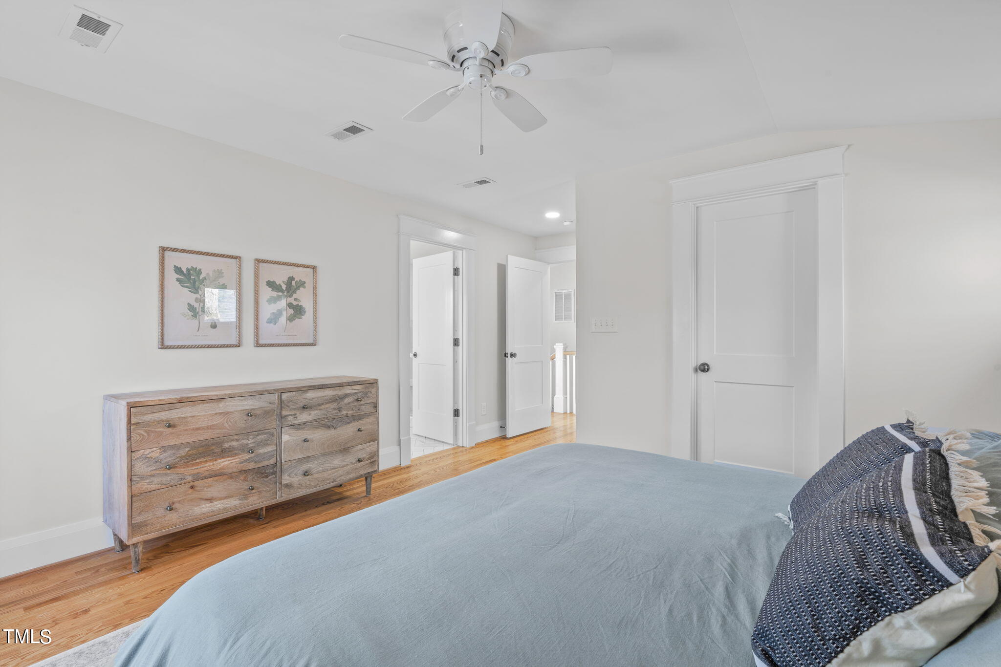 529 Euclid Street Raleigh, NC 27604 - Photo 24 of 37 a bedroom with a bed and cabinets