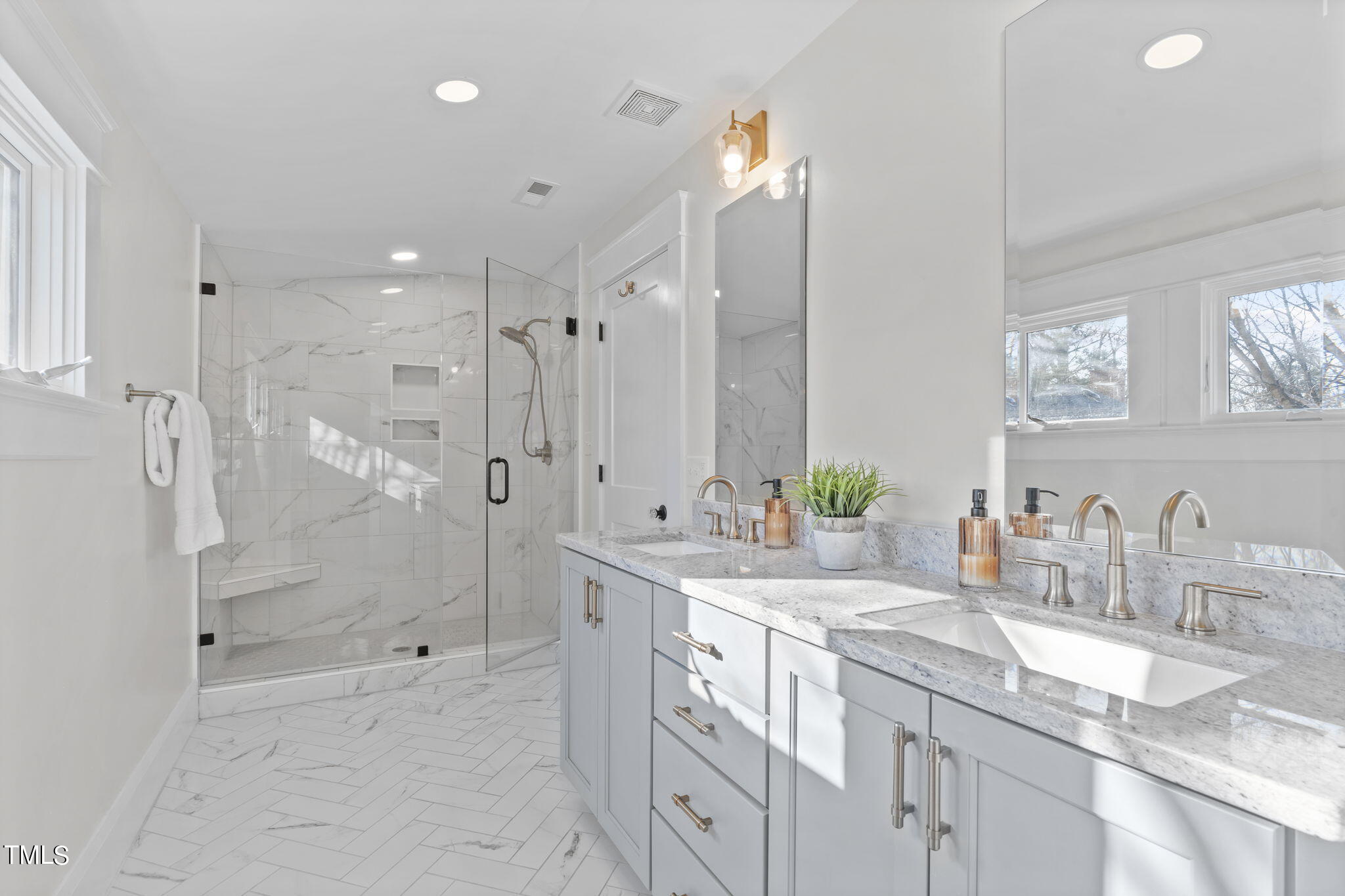 529 Euclid Street Raleigh, NC 27604 - Photo 26 of 37 a bathroom with a granite countertop sink mirror and shower