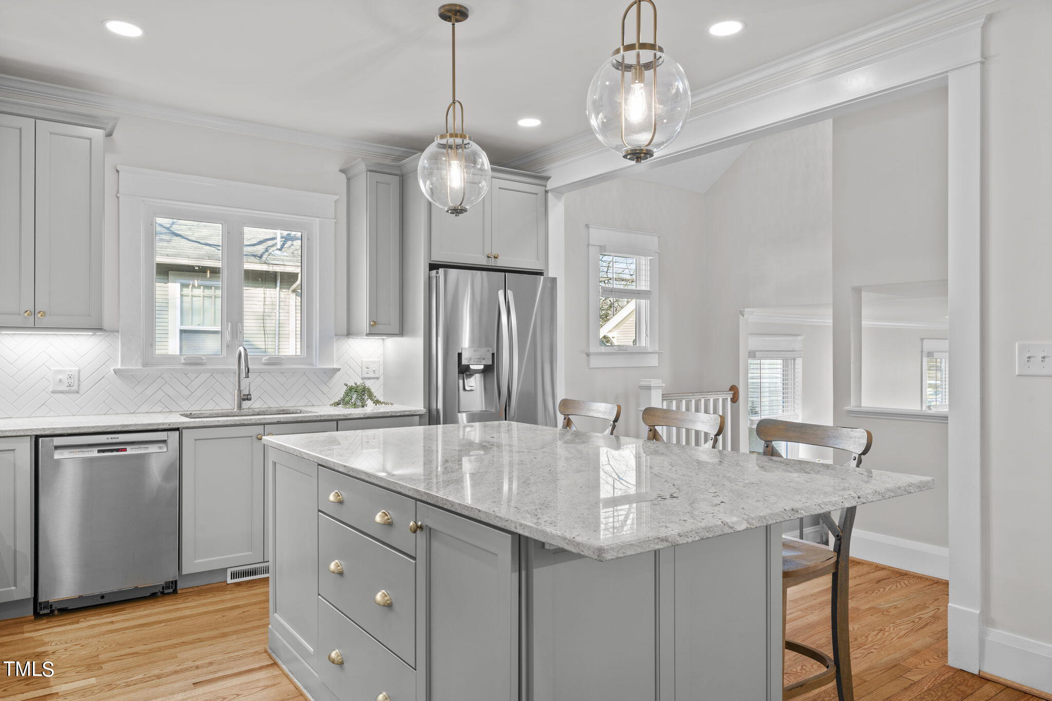 529 Euclid Street Raleigh, NC 27604 - Photo 6 of 37 a kitchen with center island table and chairs