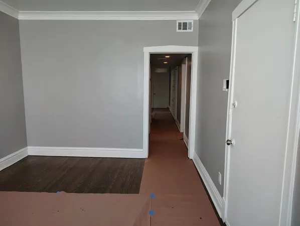 view of room with window and cabinet