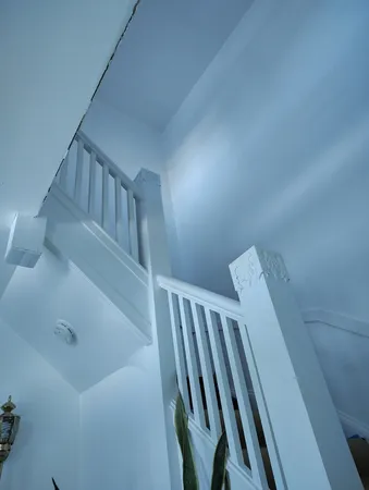 a view of stairs and an entryway