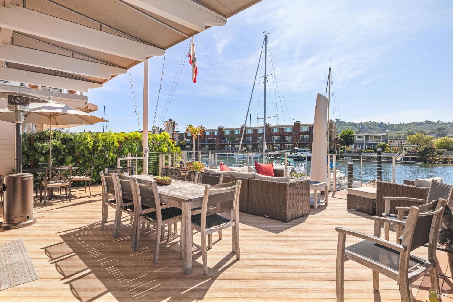 Spacious 700+ sq. ft. deck ideal for personal enjoyment or entertaining guests along the San Rafael Creek. A gangway connects to the private dock that includes a 50' side tie and 32'x15' boat slip, perfect for boating enthusiasts. Rare features offering direct water access right from your own backyard.