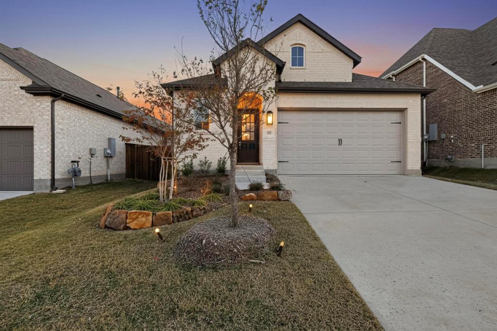 1232 Newport Street Sherman, TX 75090 - Photo 1 of 40 a front view of a house with parking