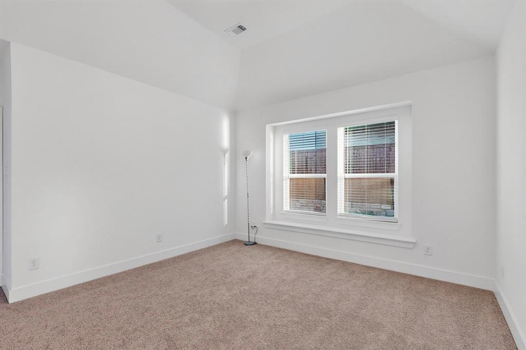 1232 Newport Street Sherman, TX 75090 - Photo 18 of 40 an empty room with a window