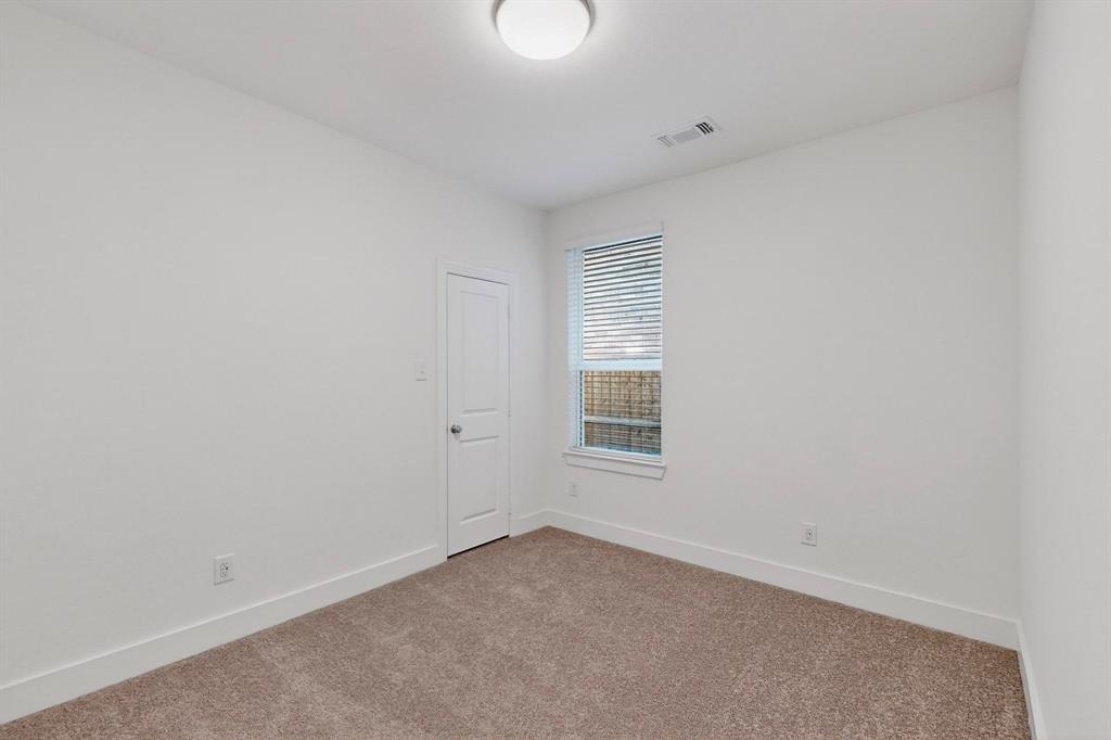 1232 Newport Street Sherman, TX 75090 - Photo 26 of 40 a view of an empty room with a window