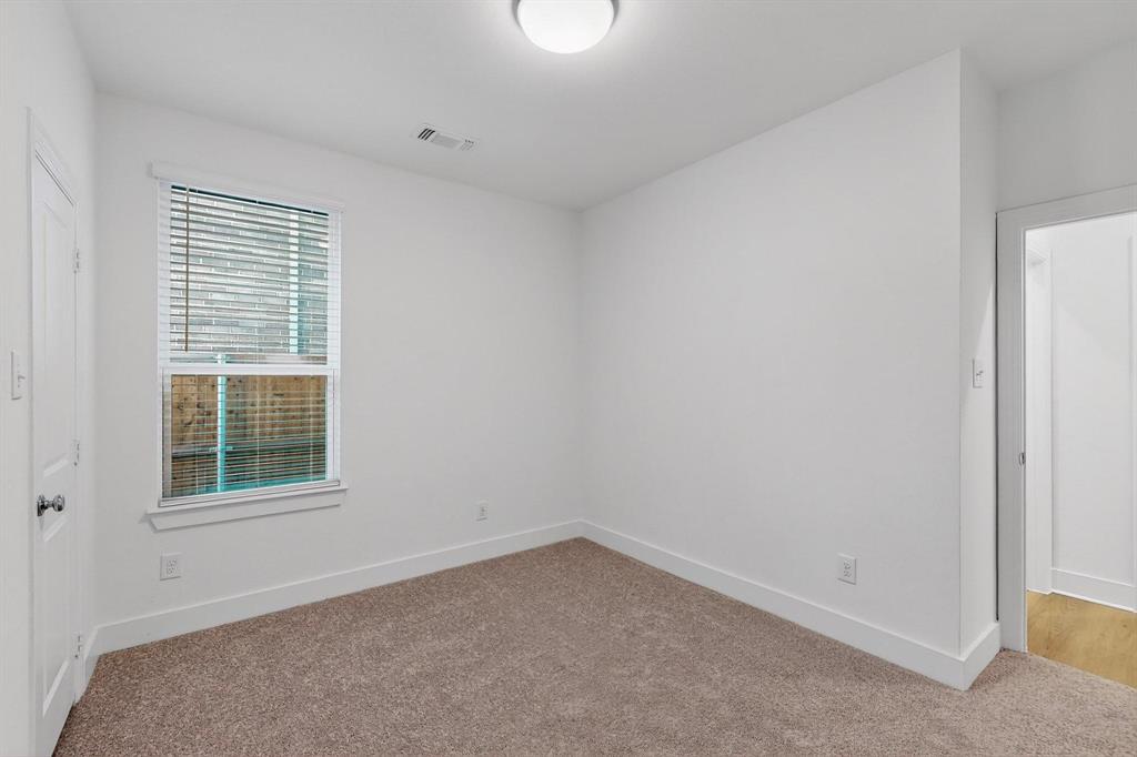 1232 Newport Street Sherman, TX 75090 - Photo 27 of 40 an empty room with a window