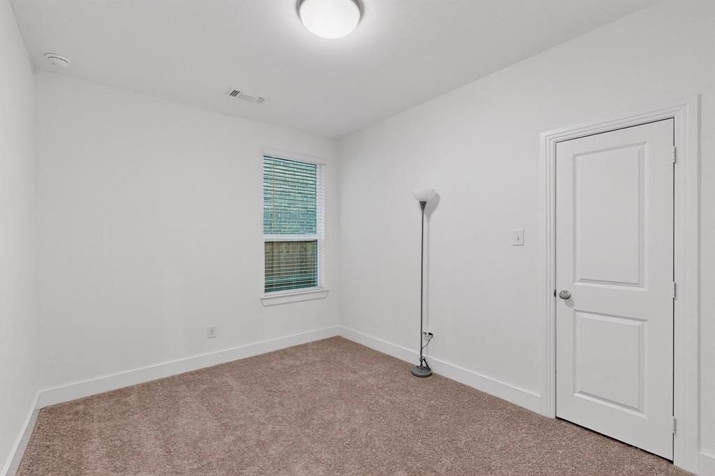 1232 Newport Street Sherman, TX 75090 - Photo 28 of 40 a view of an empty room with closet area