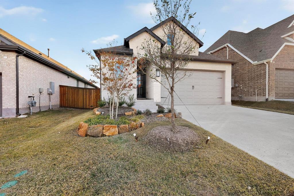 1232 Newport Street Sherman, TX 75090 - Photo 3 of 40 a front view of a house with a yard