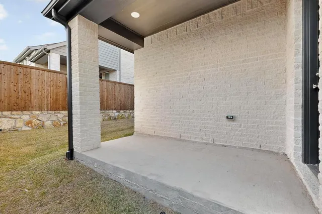 a view of a house with backyard and shower