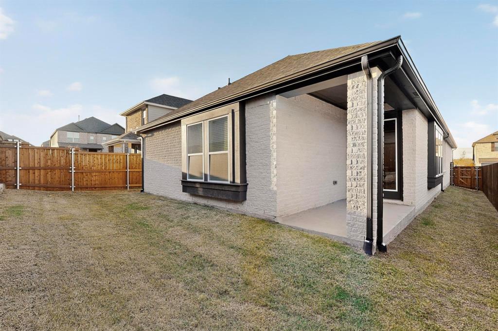 1232 Newport Street Sherman, TX 75090 - Photo 37 of 40 a view of a house with a backyard