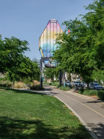 a view of a balcony with wooden floor and fence