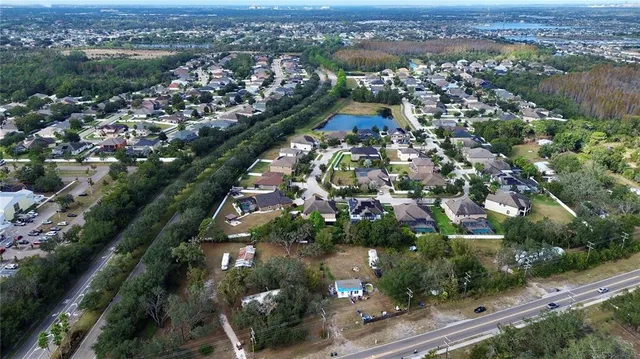 an aerial view of a city with lots of residential buildings