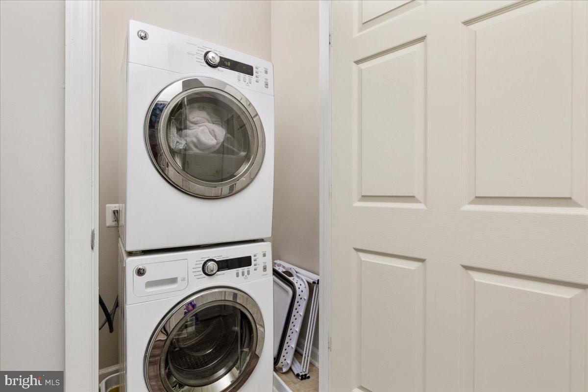 267 Patchwork Drive Stephenson, VA 22656 - Photo 16 of 41 a view of a hallway with washer and dryer