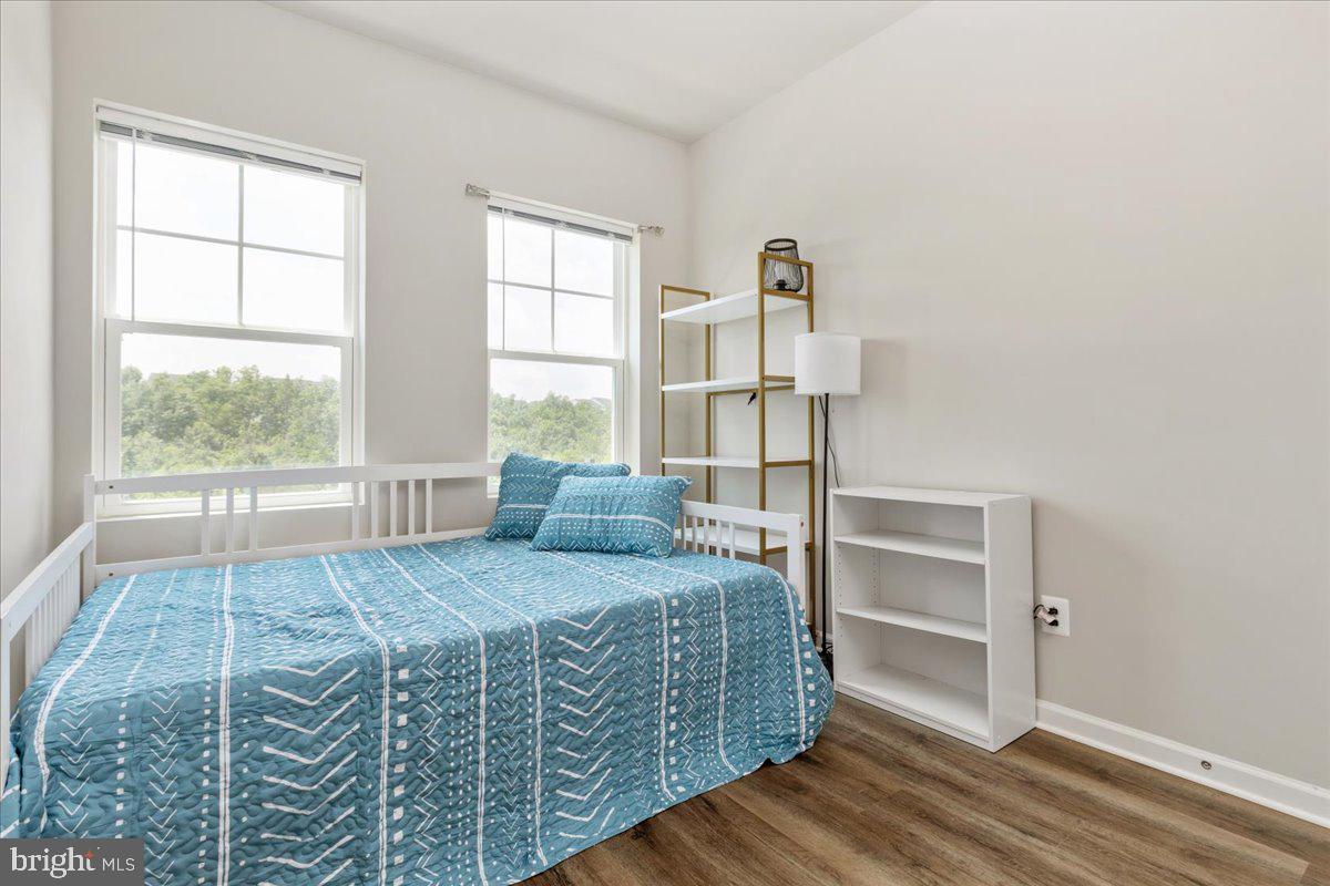 267 Patchwork Drive Stephenson, VA 22656 - Photo 18 of 41 a bedroom with a bed and wooden floor