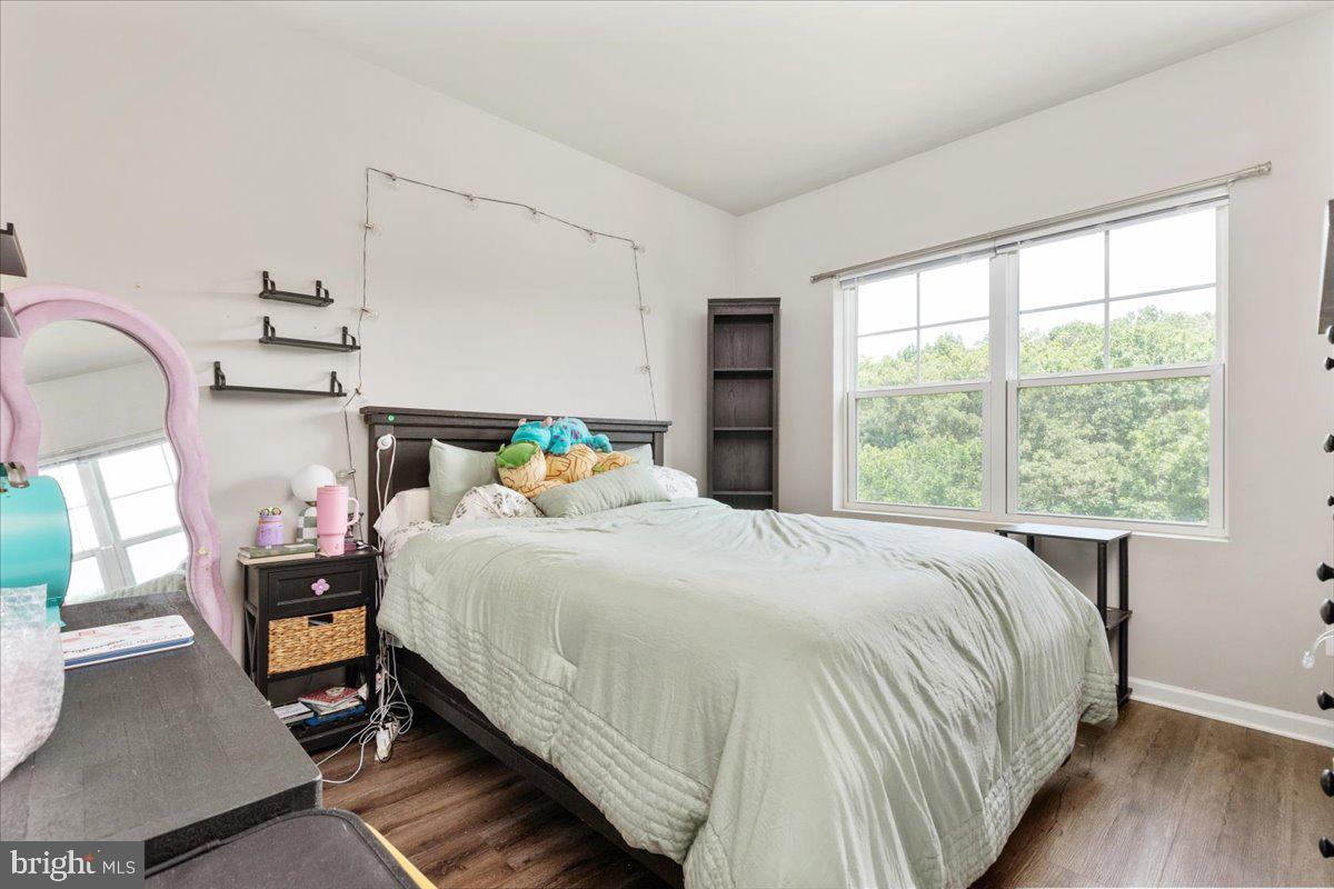 267 Patchwork Drive Stephenson, VA 22656 - Photo 21 of 41 a bedroom with a bed and wooden floor