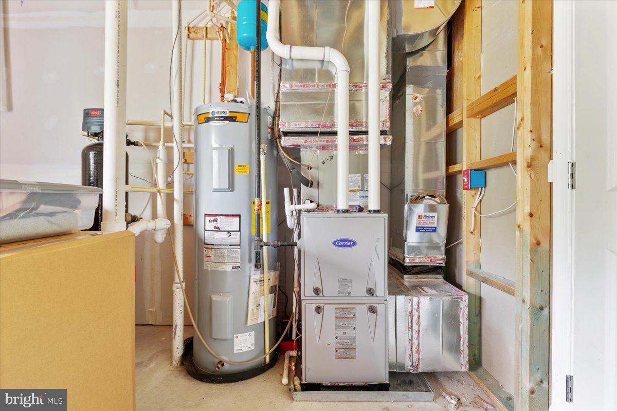 267 Patchwork Drive Stephenson, VA 22656 - Photo 4 of 41 a room with water heater and a window