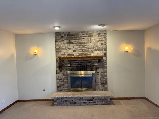 a living room with fireplace