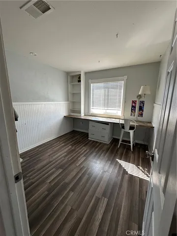 wooden floor and window in a room