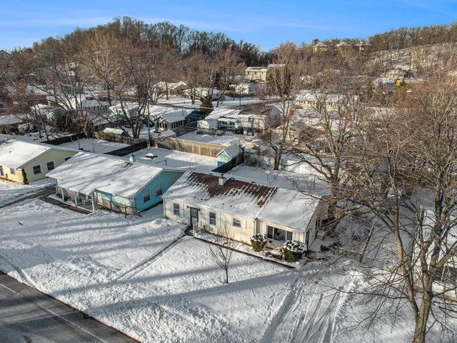 a picture of a bench in a white building