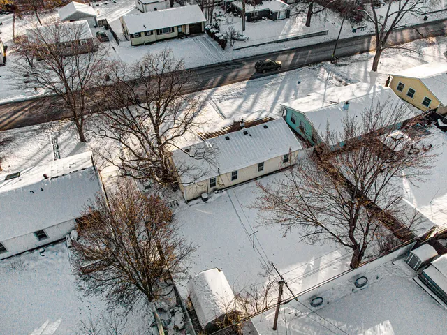a view of a wooden fence