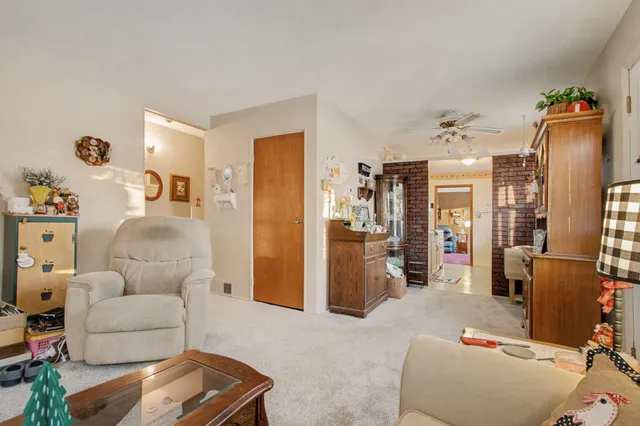 a living room with furniture and a couch