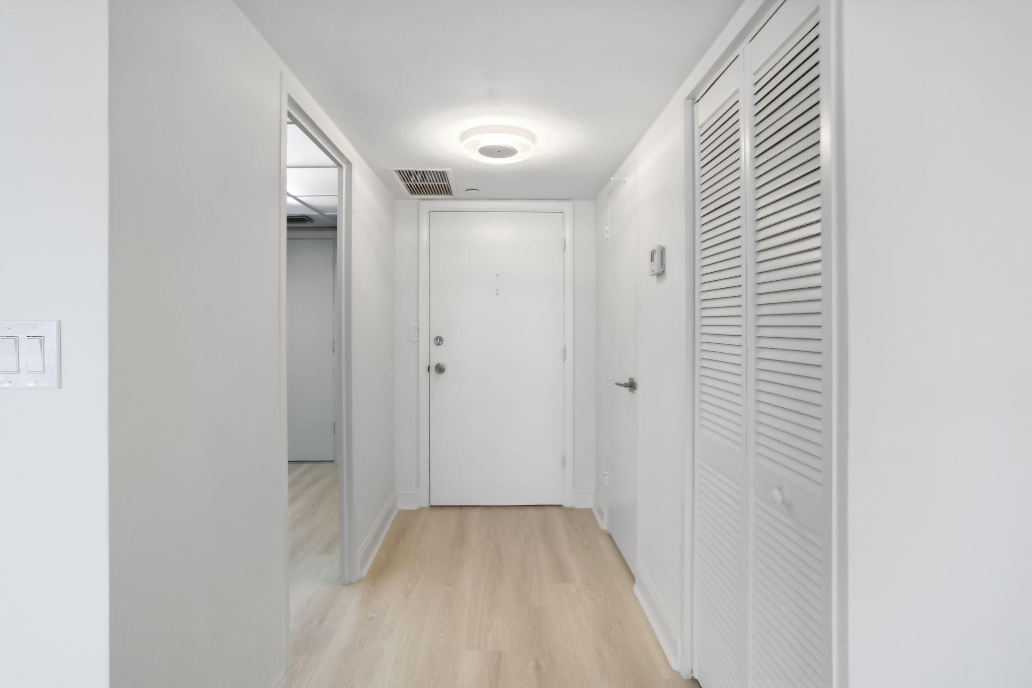 701 East Camino Real, Unit 6C Boca Raton, FL 33432 - Photo 18 of 53 a view of a hallway