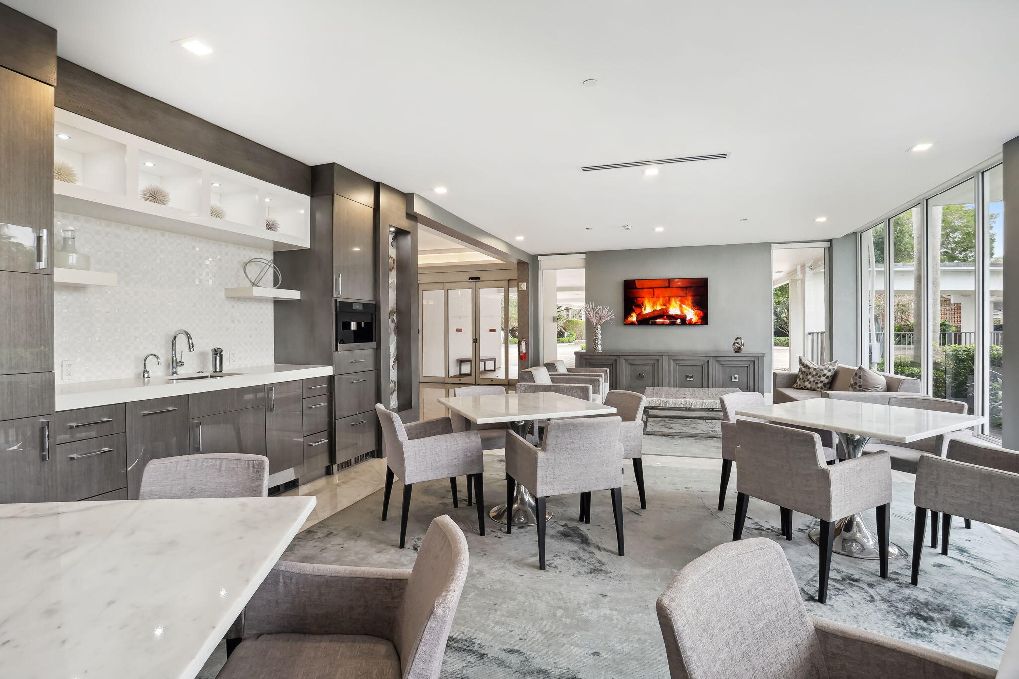 701 East Camino Real, Unit 6C Boca Raton, FL 33432 - Photo 39 of 53 a view of a dining room with furniture