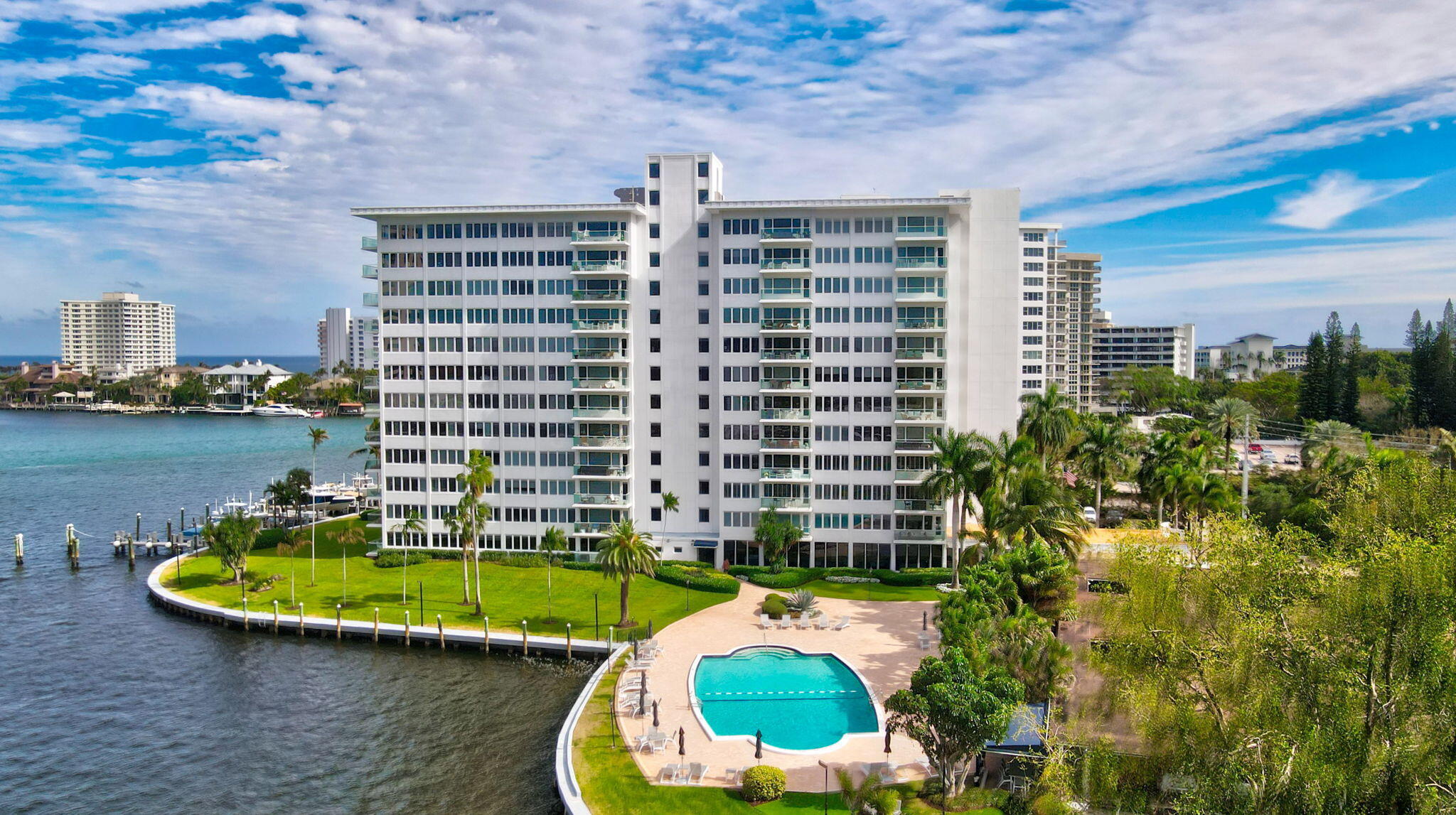701 East Camino Real, Unit 6C Boca Raton, FL 33432 - Photo 43 of 53 a view of a swimming pool with a patio