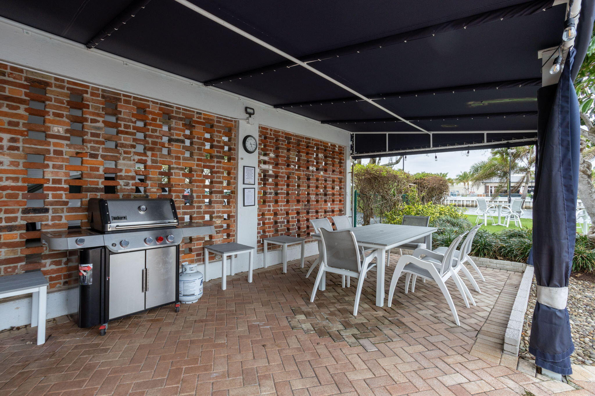701 East Camino Real, Unit 6C Boca Raton, FL 33432 - Photo 48 of 53 a open kitchen with a table and chairs