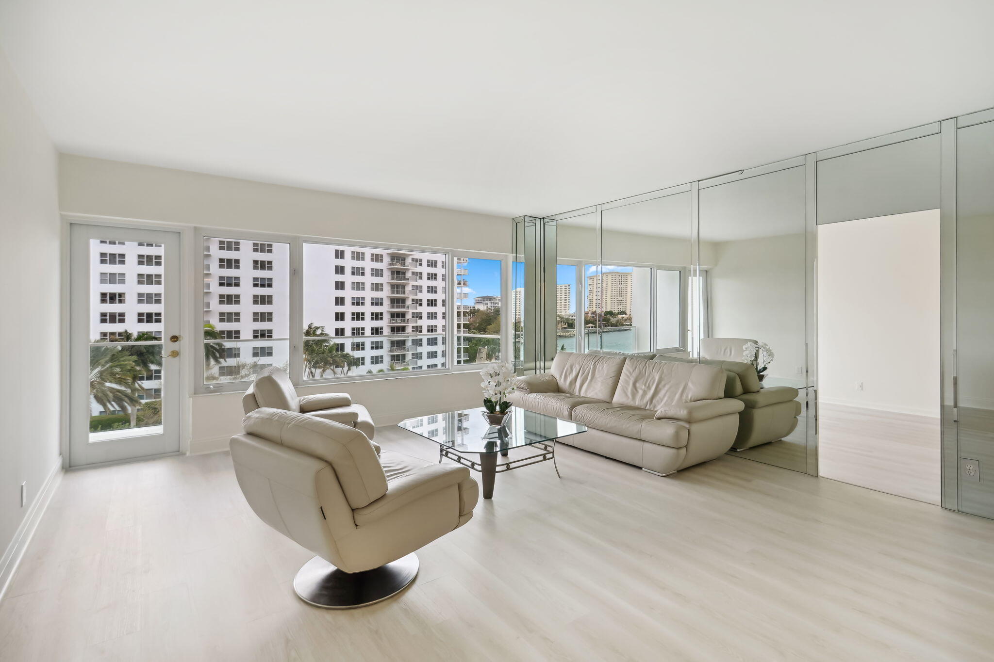 701 East Camino Real, Unit 6C Boca Raton, FL 33432 - Photo 5 of 53 a living room with furniture and a large window