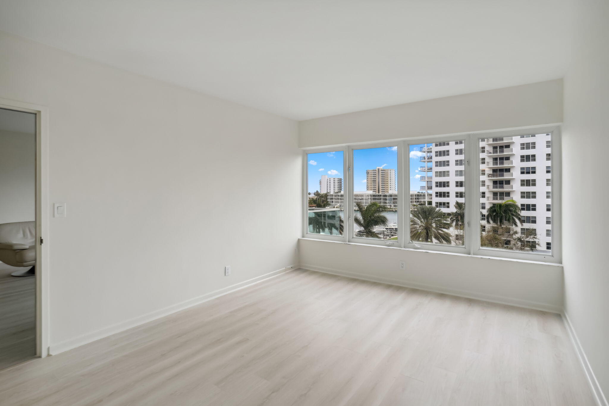 701 East Camino Real, Unit 6C Boca Raton, FL 33432 - Photo 10 of 53 an empty room with a window