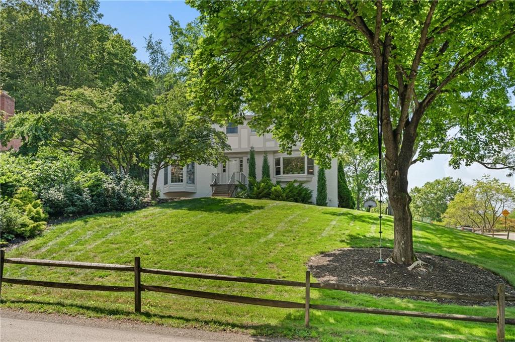 323 Cornwall Drive Pittsburgh, PA 15238 - Photo 1 of 41 a view of a house with a yard