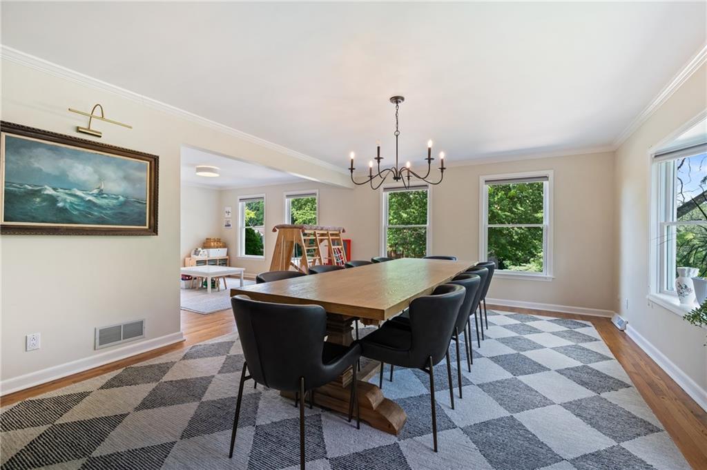 323 Cornwall Drive Pittsburgh, PA 15238 - Photo 14 of 41 a view of a dining room with furniture window and wooden floor