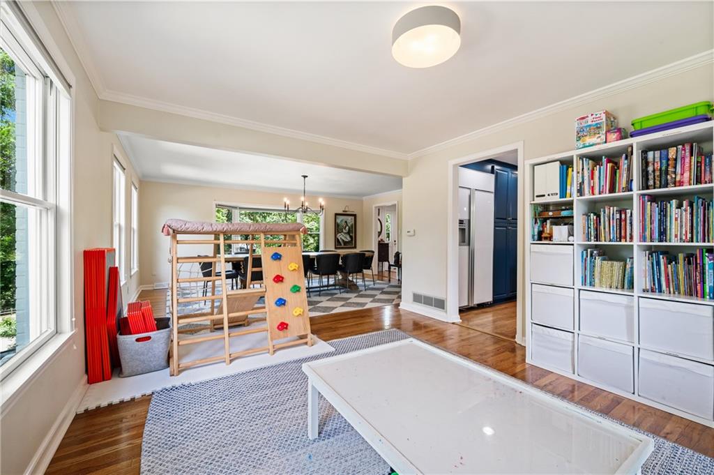 323 Cornwall Drive Pittsburgh, PA 15238 - Photo 15 of 41 a living room with furniture and a book shelf