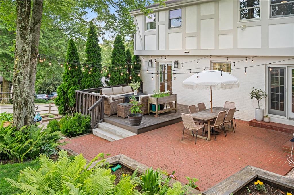 323 Cornwall Drive Pittsburgh, PA 15238 - Photo 3 of 41 a roof deck with table and chairs and potted plants