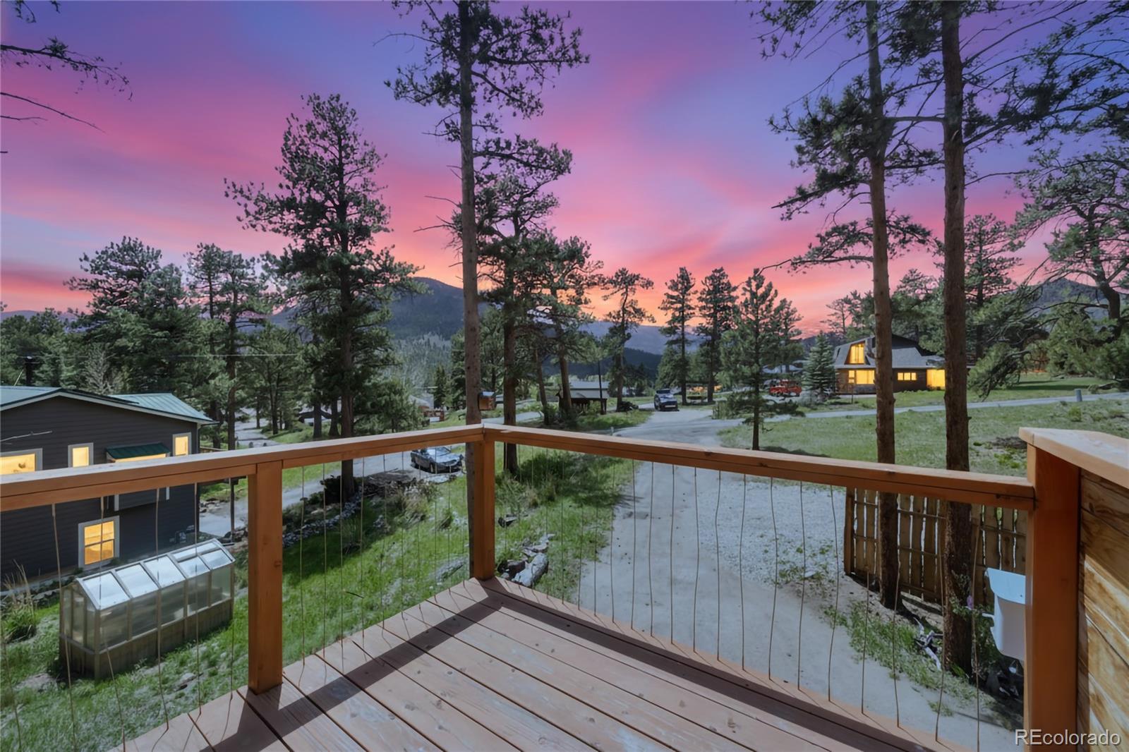 810 Larkspur Road Estes Park, CO 80517 - Photo 34 of 44 a view of a balcony with outdoor space