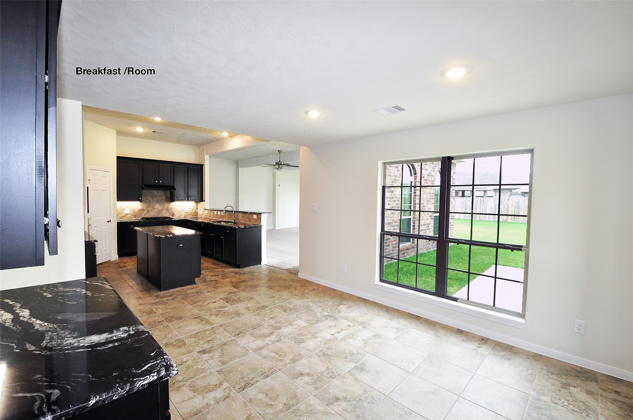 3708 Pedregal Road League City, TX 77573 - Photo 20 of 50 a kitchen with stainless steel appliances granite countertop a stove and a sink