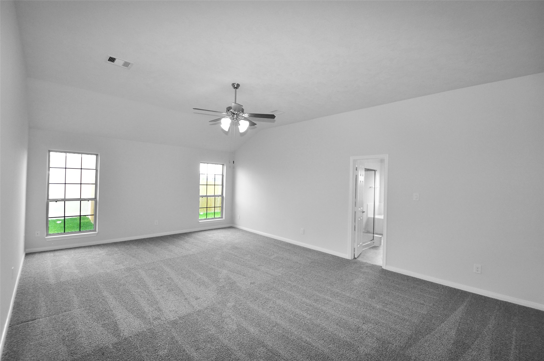 3708 Pedregal Road League City, TX 77573 - Photo 23 of 50 an empty room with windows and chandelier fan