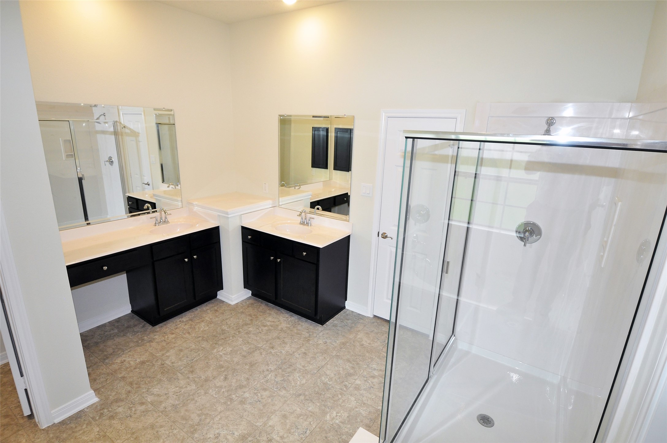 3708 Pedregal Road League City, TX 77573 - Photo 27 of 50 a view of a bathroom with a double vanity sink a mirror and a bathtub
