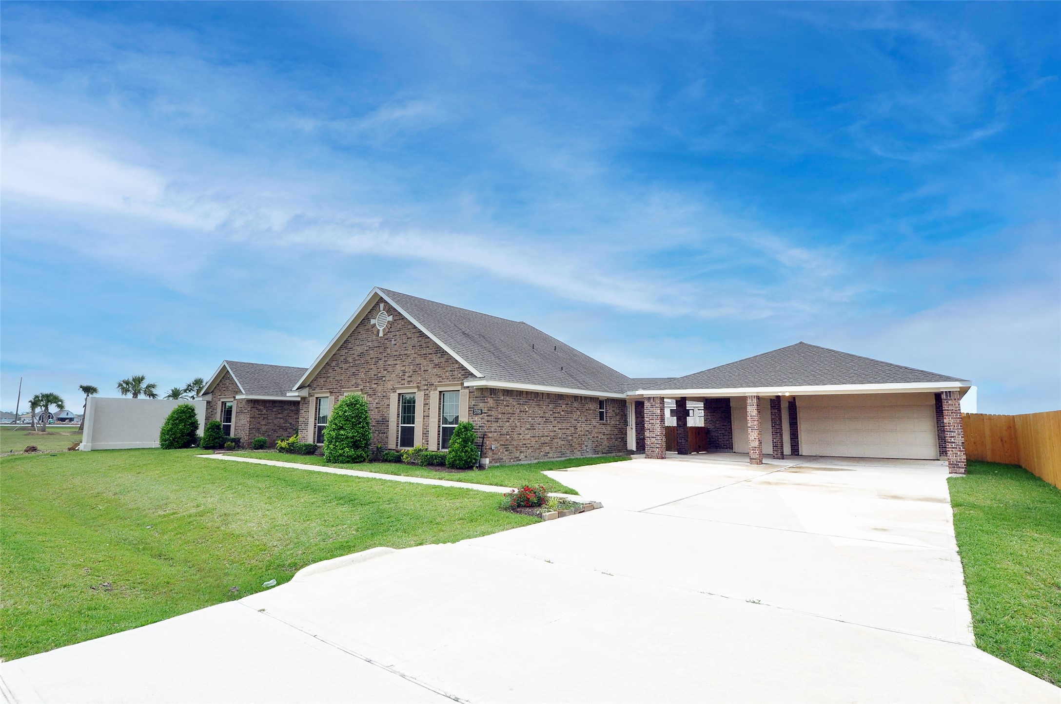 3708 Pedregal Road League City, TX 77573 - Photo 3 of 50 a front view of a house with a yard