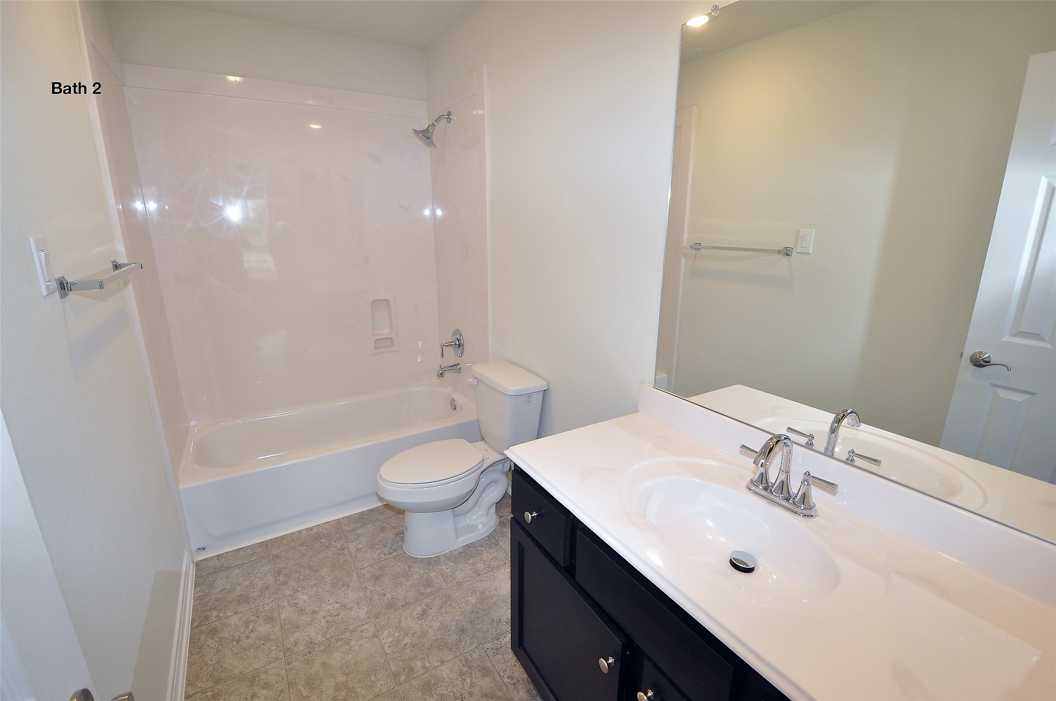 3708 Pedregal Road League City, TX 77573 - Photo 33 of 50 a bathroom with a sink a toilet and shower