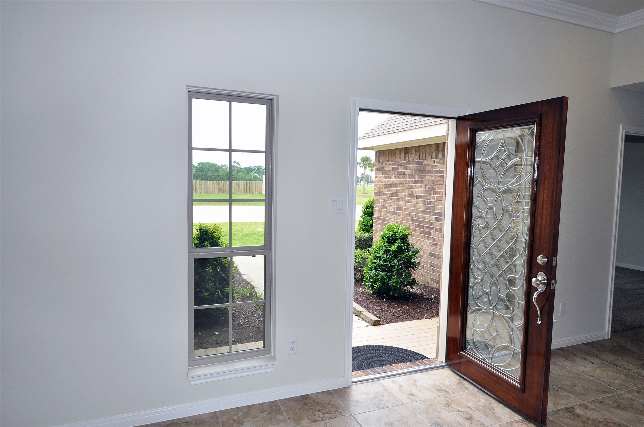 3708 Pedregal Road League City, TX 77573 - Photo 9 of 50 a view of an entryway with wooden floor and a porch