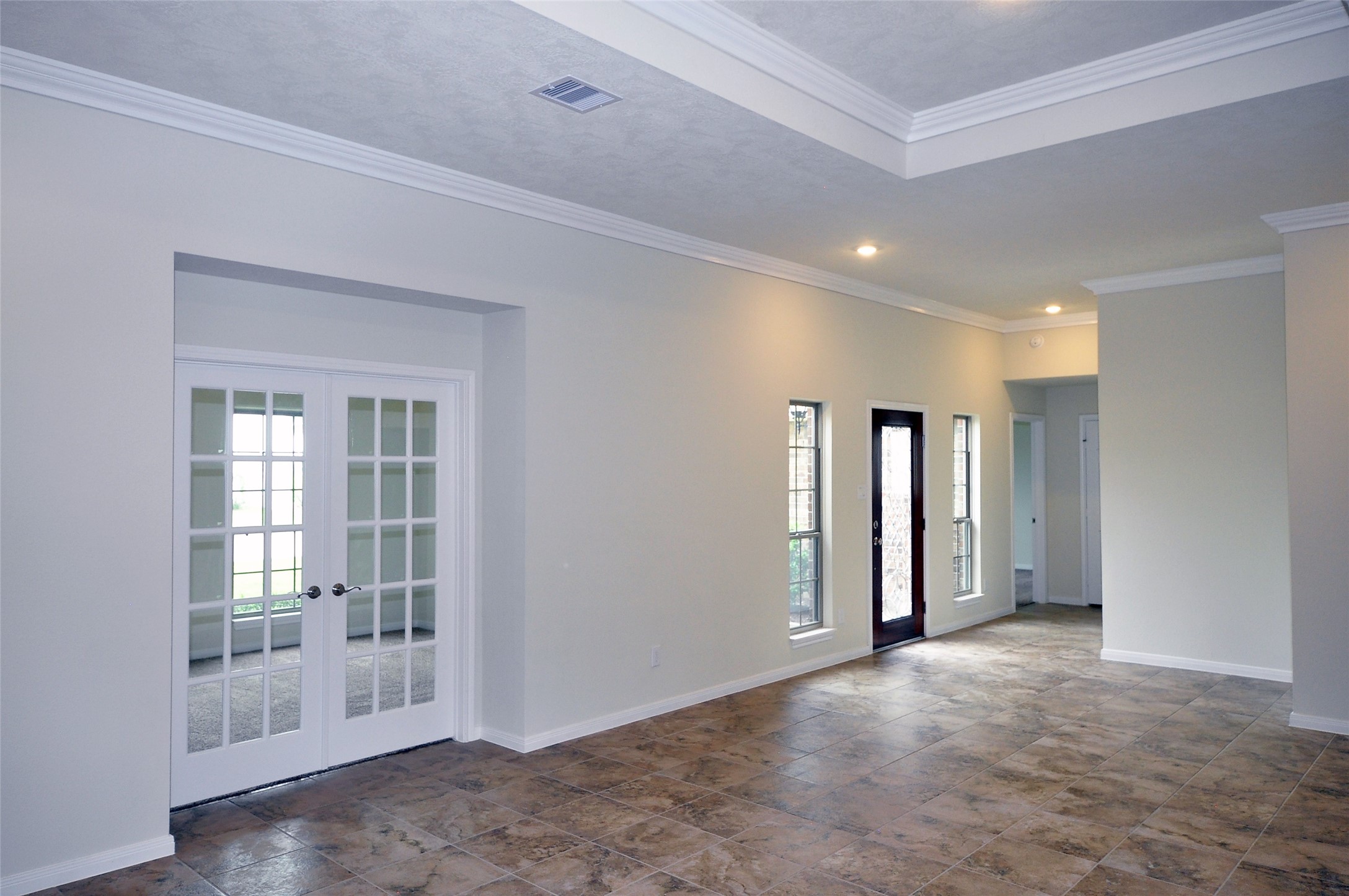3708 Pedregal Road League City, TX 77573 - Photo 10 of 50 wooden floor and windows in an empty room